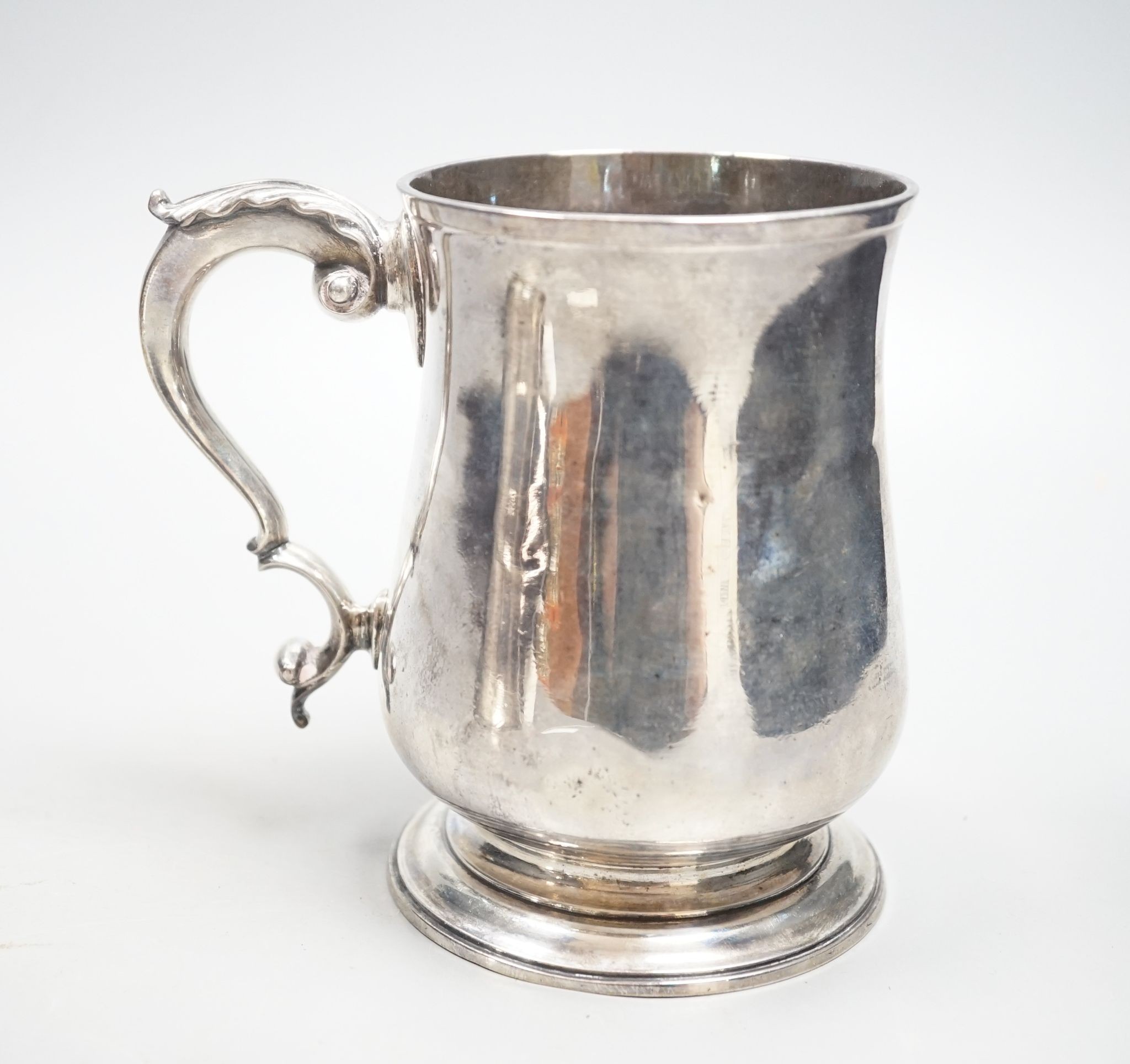 A George III silver baluster mug, Charles Wright, London, 1772, 13cm, 13.5oz.